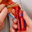 Universal stripping tool for left-handed people