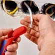 Universal stripping tool for left-handed people