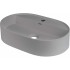 Granite countertop washbasin with a faucet island - oval