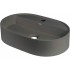 Granite countertop washbasin with a faucet island - oval