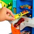 Hot Wheels City Ultimate T-Rex Garage with 2 Toy Cars & Storage for 50+, Race & Stunt, Dino Nemesis Hot Wheels City Ultimate T-Rex Garage with 2 Toy Cars & Storage for 50+, Race & Stunt, Dino Nemesis