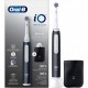 Oral-B toothbrush, white and black + cover