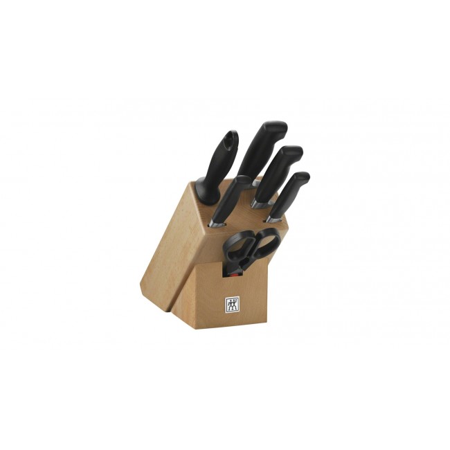 Set of 4 knives in a Zwilling Four Star block Set of 4 knives in a Zwilling Four Star block